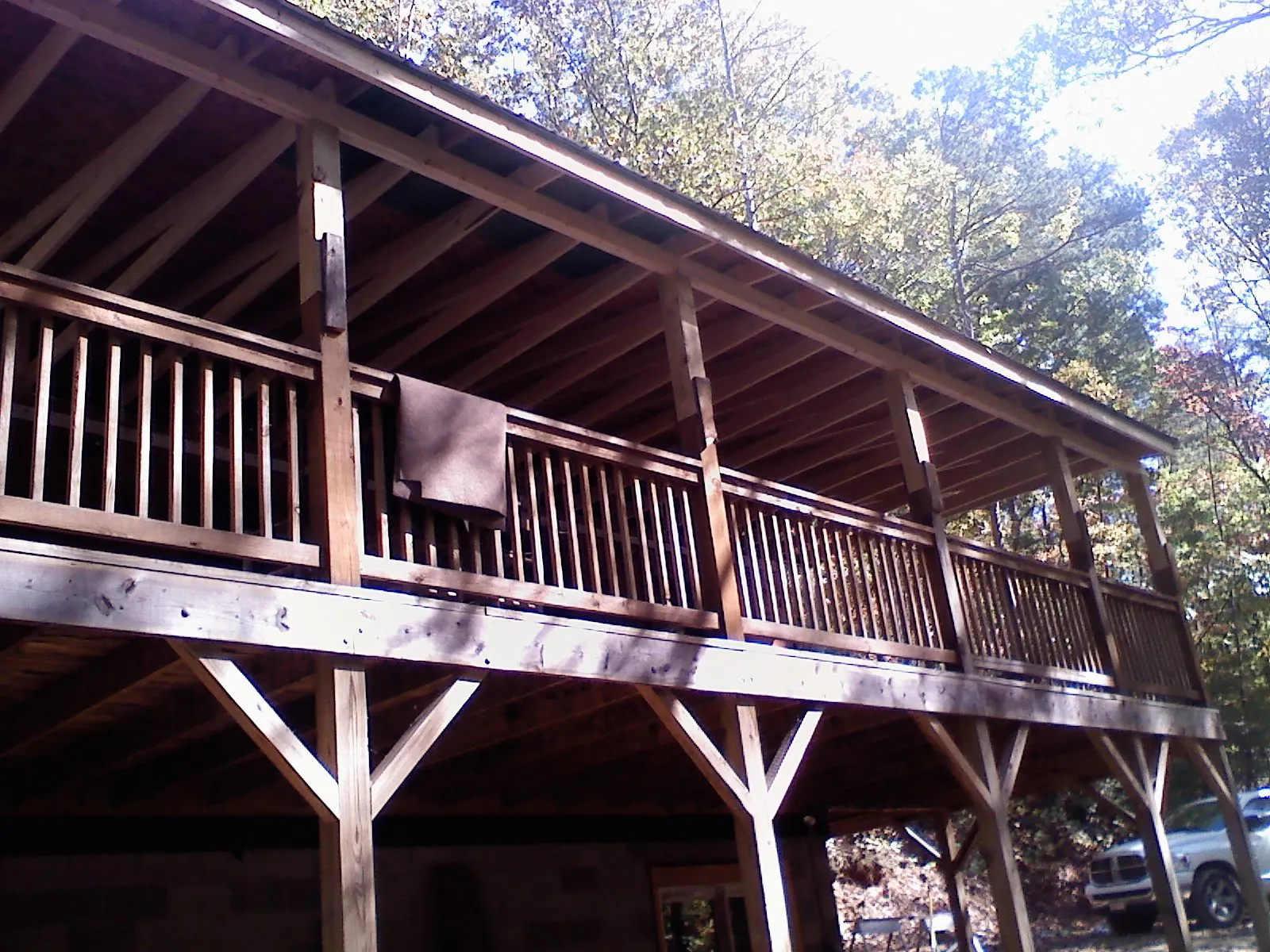 Timber framing under a new elevated porch and deck — Roof Leak Repair in Sacramento by Roofing Brothers